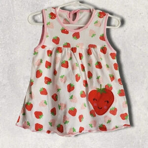 6-12m Baby Girl Dress. White with Strawberrys.